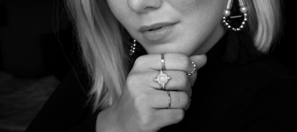Earrings from H&M and rings from Lindex.